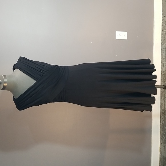 Frank Lyman Design Dresses & Skirts - Frank Lyman size 6 black dress made in Canada stretchy fabric.  Designer quality